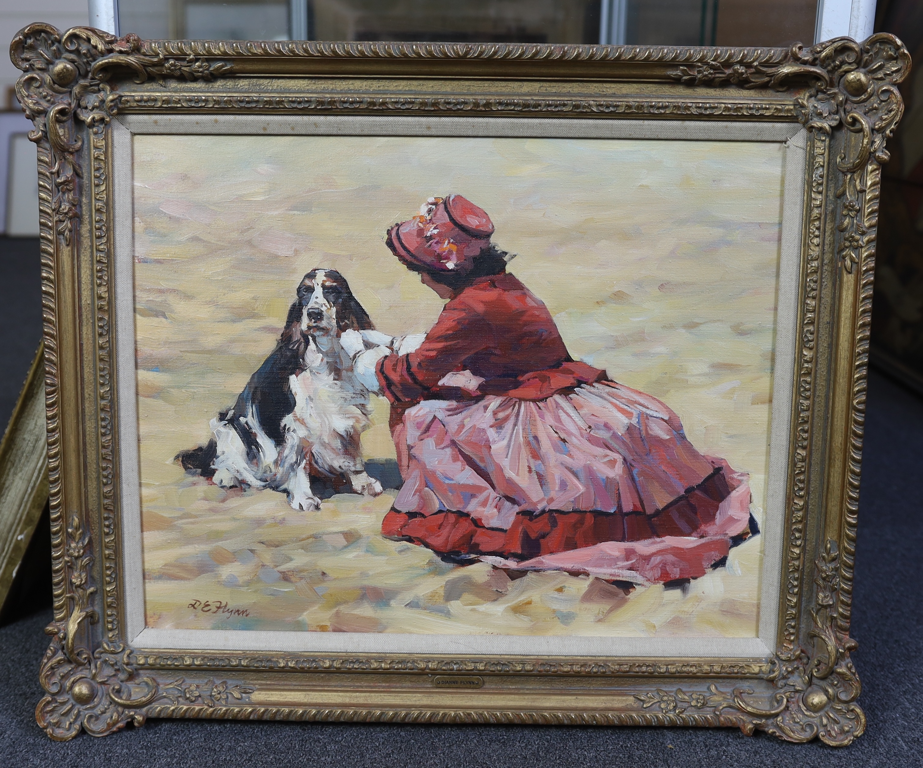 Dianne E. Flynn (English, b.1939), oil on canvas, Woman and spaniel on the beach, signed, 40 x 50cm